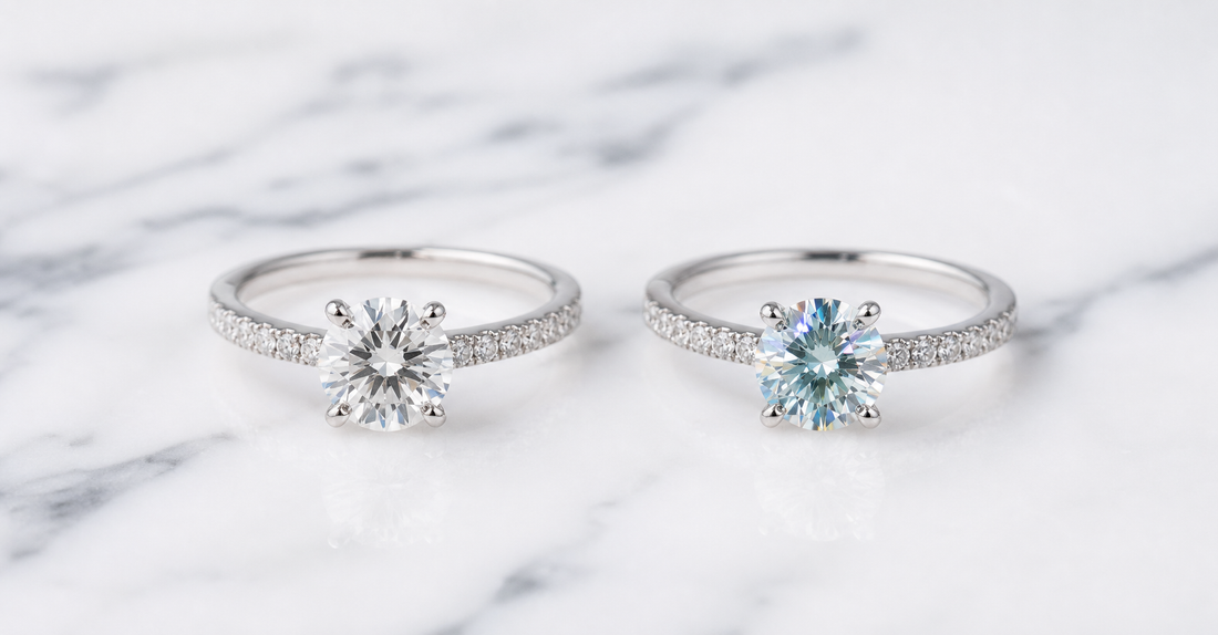 Moissanite vs diamond rings side by side on marble surface