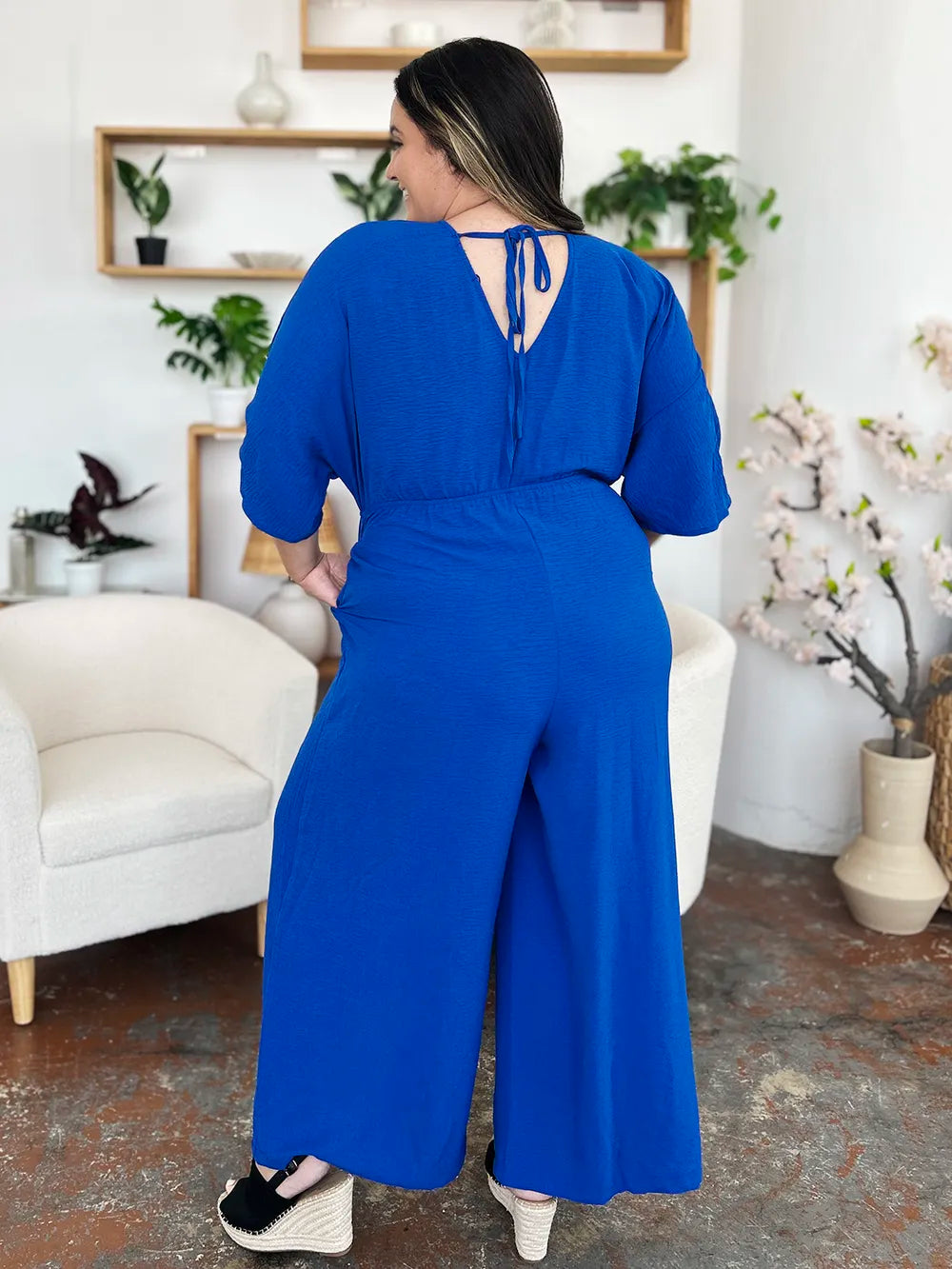 Plus Size Surplice Wide Leg Jumpsuit with Pockets in Mid Green for Women