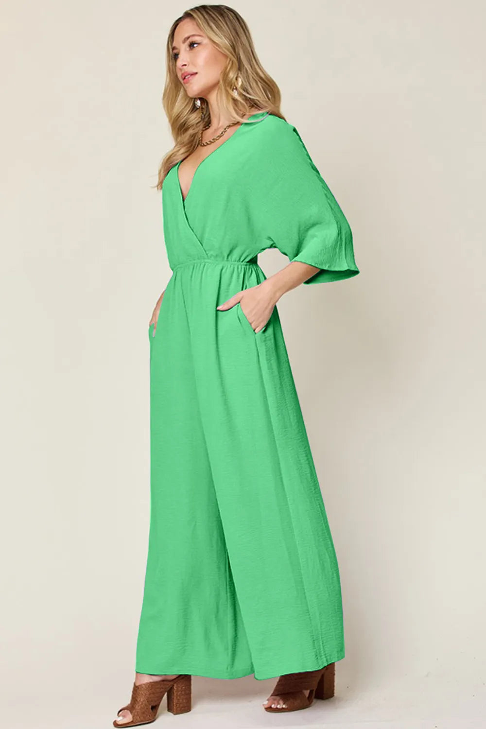 Plus Size Surplice Wide Leg Jumpsuit with Pockets in Lavender for Women