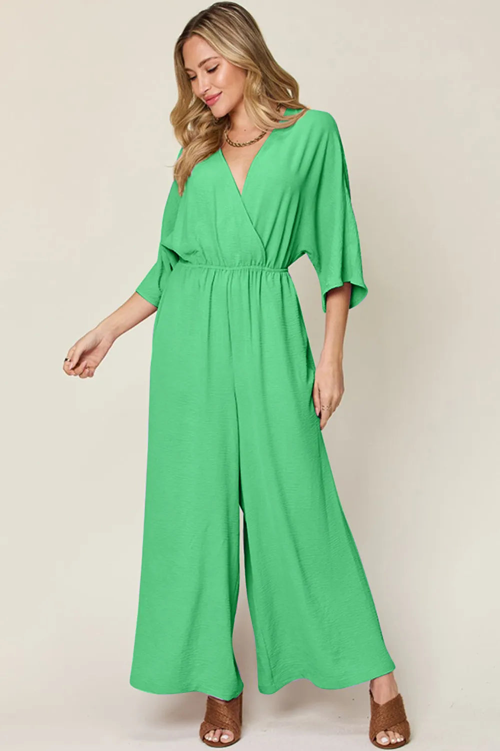 Plus Size Surplice Wide Leg Jumpsuit with Pockets in Lavender for Women