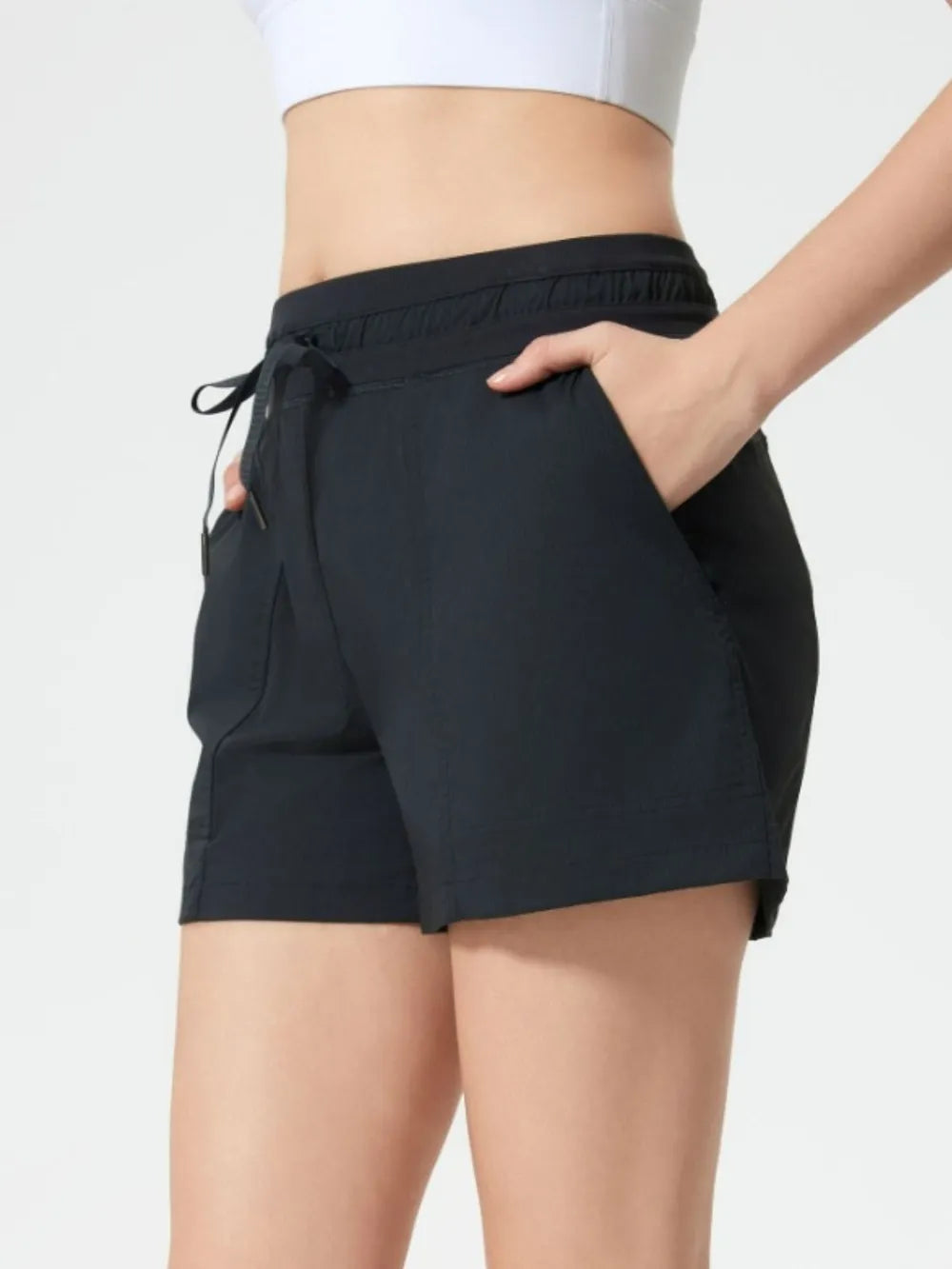 Drawstring Active Shorts with Pockets in Black for Women