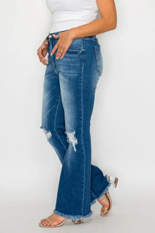 Plus Size Raw Hem Distressed High Rise Bootcut Jeans in Medium for Women