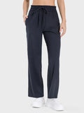 Drawstring Pocketed Active Pants in Black for Women