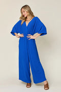 Plus Size Surplice Wide Leg Jumpsuit with Pockets in Royal Blue for Women
