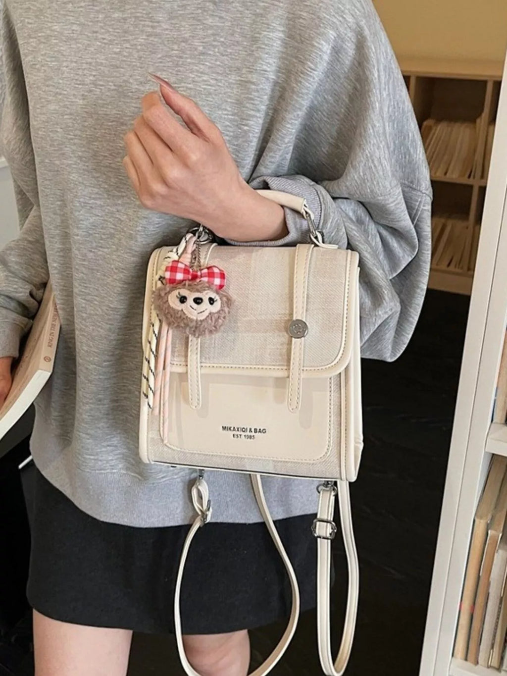 Flap Backpack Bag with Plush Charm for Women