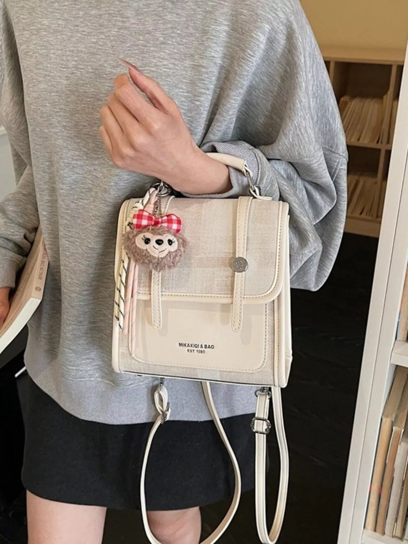Flap Backpack Bag with Plush Charm for Women