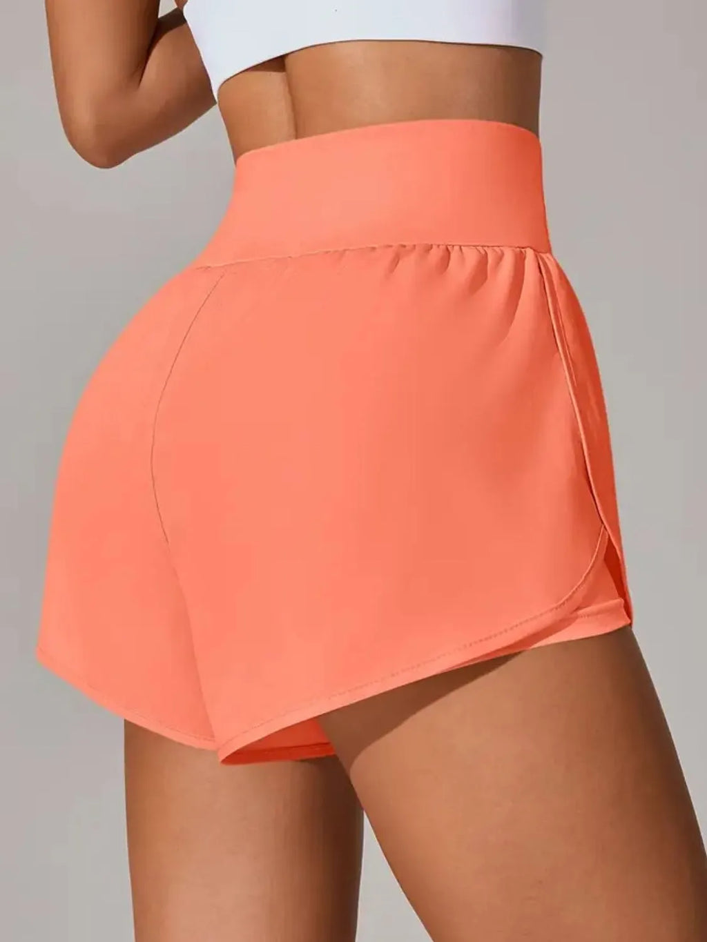 Pocketed High Waist Active Shorts in Blush Pink for Women