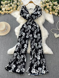 Black Floral Print Wide Leg Pleated Jumpsuit in Black for Women