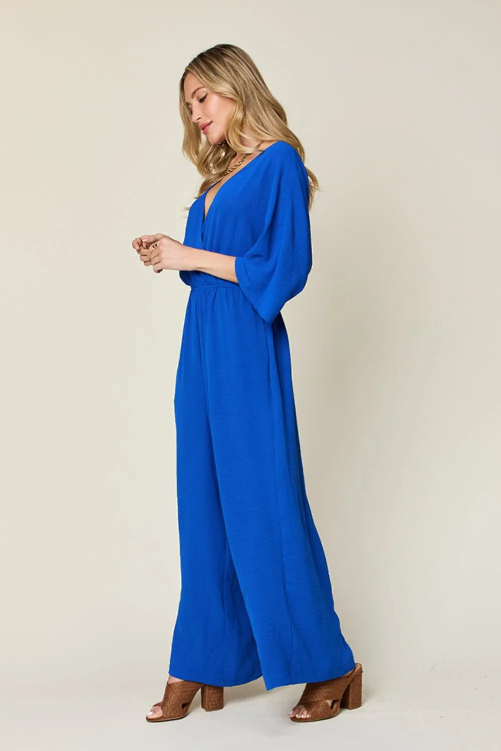 Plus Size Surplice Wide Leg Jumpsuit with Pockets in Royal Blue for Women