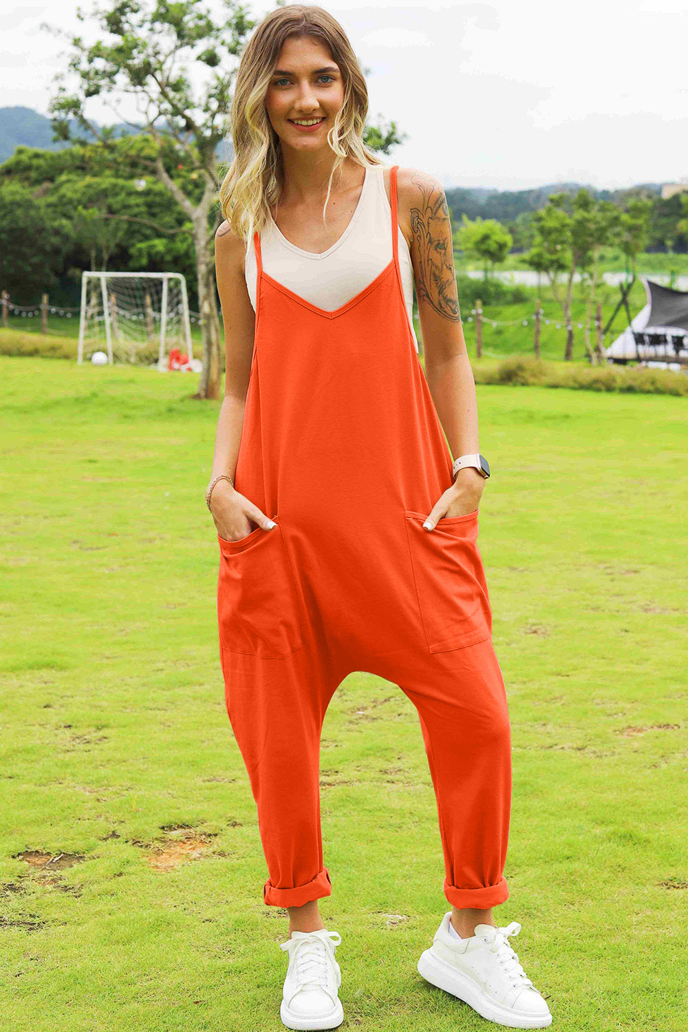 Plus Size Sleeveless V-Neck Pocketed Jumpsuit in Orange for Women