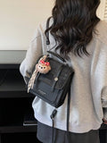 Flap Backpack Bag with Plush Charm in Black for Women