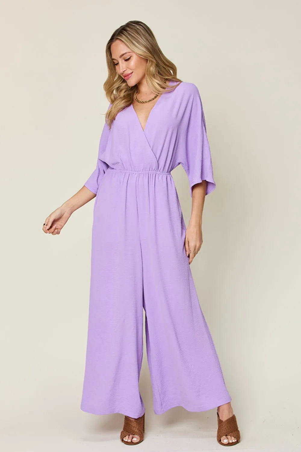 Plus Size Surplice Wide Leg Jumpsuit with Pockets in Lavender for Women