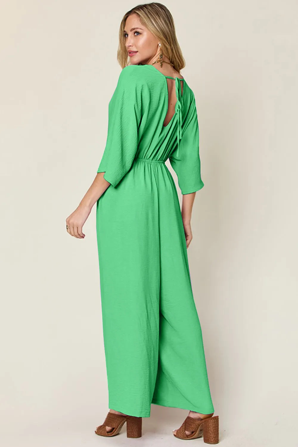 Plus Size Surplice Wide Leg Jumpsuit with Pockets in Lavender for Women