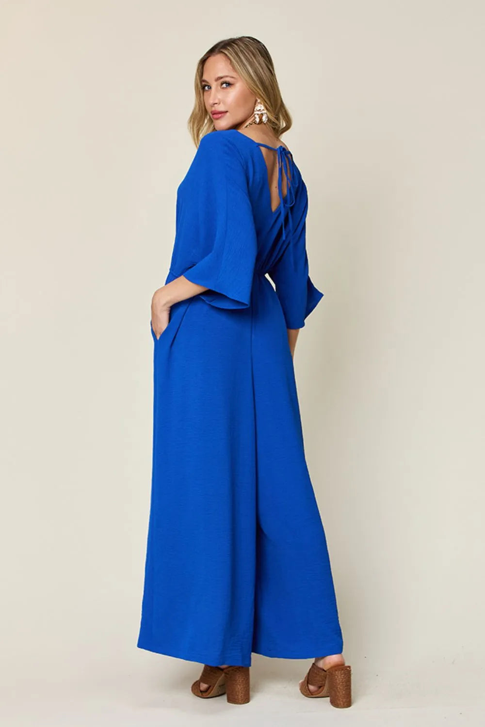 Plus Size Surplice Wide Leg Jumpsuit with Pockets in Royal Blue for Women