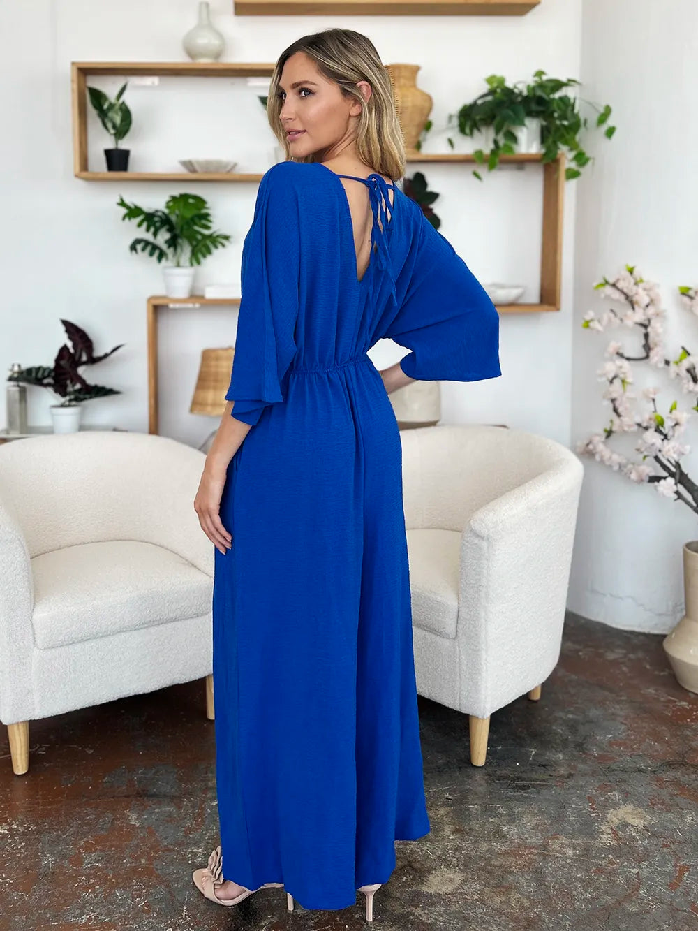 Plus Size Surplice Wide Leg Jumpsuit with Pockets in Lavender for Women