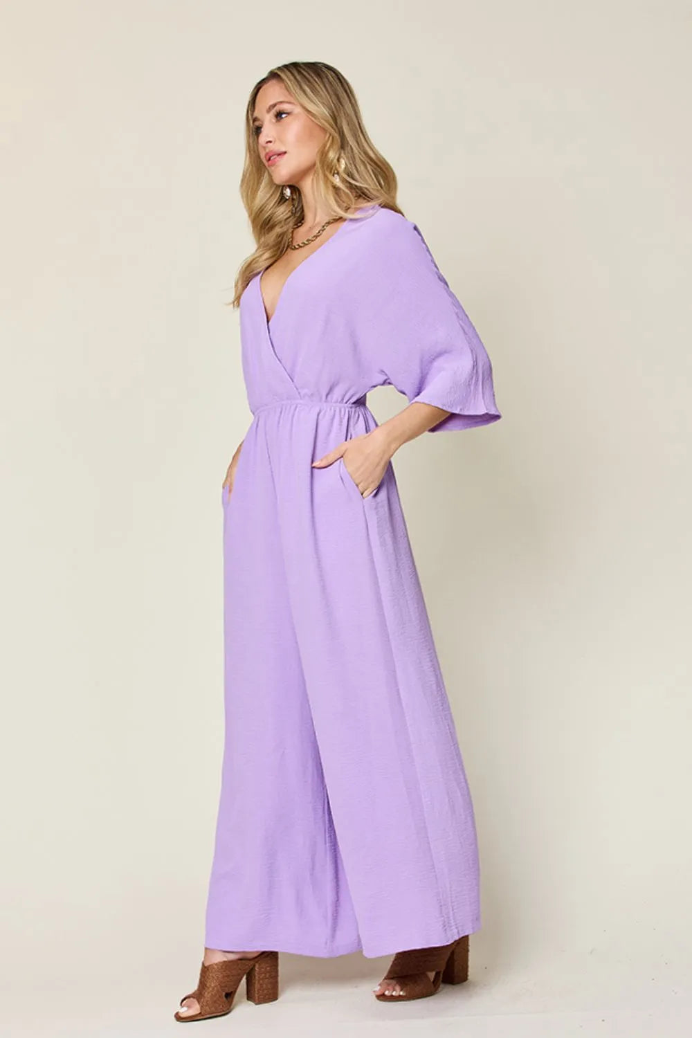 Plus Size Surplice Wide Leg Jumpsuit with Pockets in Lavender for Women